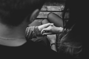 Couple holding hands